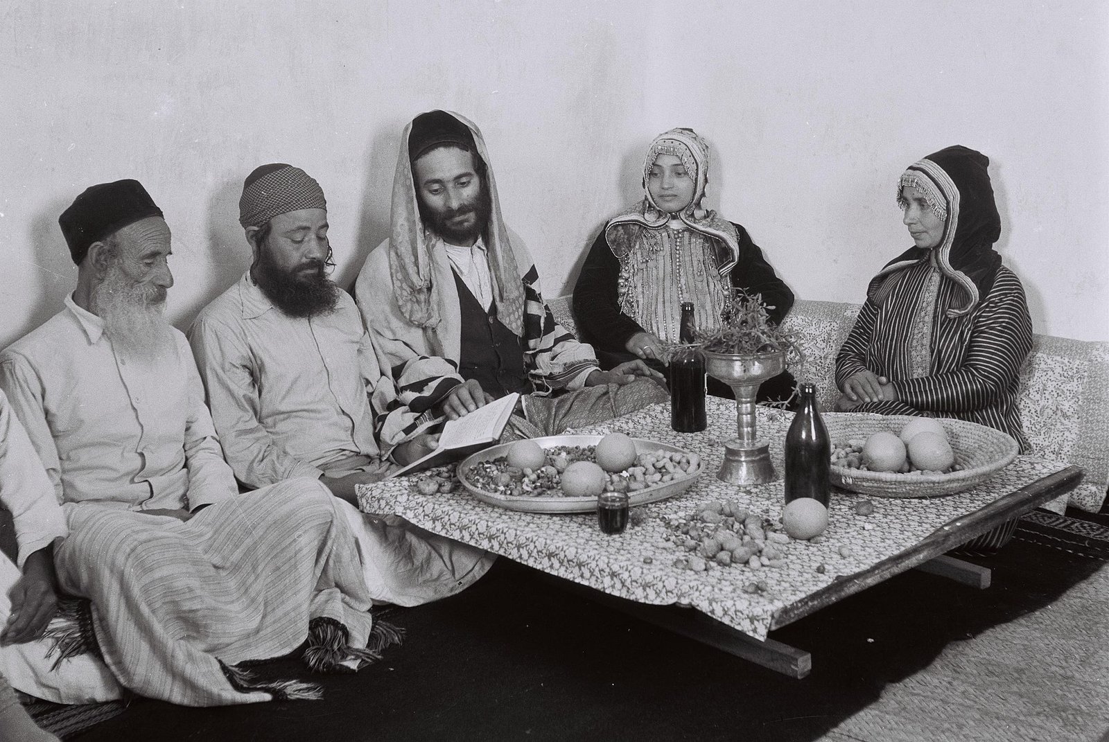 px A YEMENITE FAMILY READING FROM THE PSALMS ON SHABBAT AFTER LUNCH